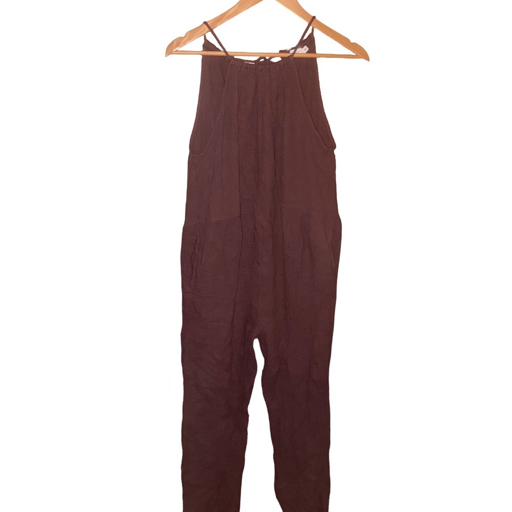 Brown Jumpsuit with Tan Straw Bag